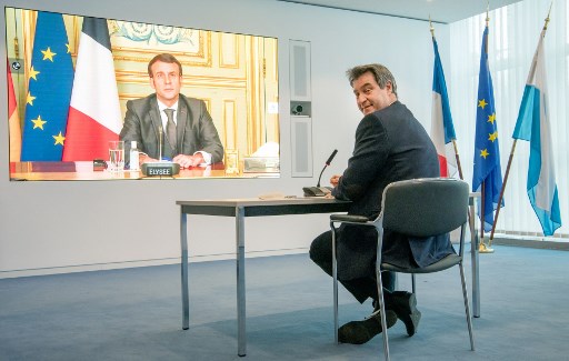 Une visioconférence entre Emmanuel Macron et Markus Söder, le favori des sondages pour succéder à Angela Merkel en Allemagne (Photo, AFP)