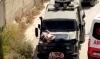 Cisjordanie: des soldats israéliens attachent un Palestinien sur un véhicule militaire