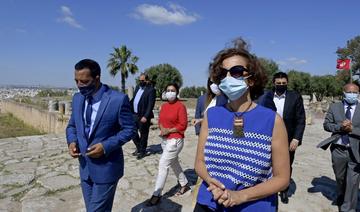 La Directrice générale de l'UNESCO Audrey Azoulay (C) visite le site archéologique de Carthage dans la capitale Tunis le 8 juin 2021. (AFP)