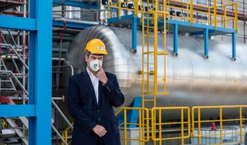 Le Premier ministre de l'État de Bavière, Markus Soeder, visite le chantier de construction de l'entreprise allemande de fabrication de plastique Leuna-Harze à Leuna, dans l'est de l'Allemagne, le 21 mai 2021. (Jens Schlueter / AFP