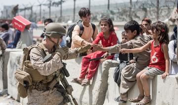 L'armée US montre ses militaires prenant soin d'enfants afghans