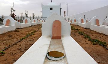 Tunisie: des parents de migrants portés disparus fouillent des tombes 