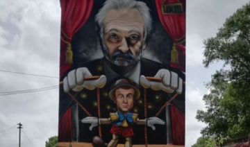 Amende requise pour l'auteur d'une fresque représentant Jacques Attali manipulant Emmanuel Macron