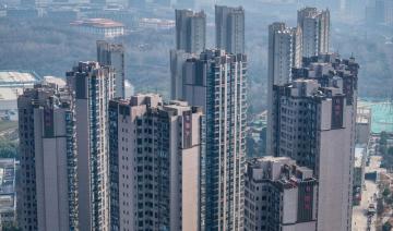 Pékin admet devoir faire plus pour l'emploi et le secteur immobilier