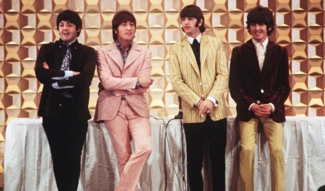 Cette photo prise le 29 juin 1966 montre des membres du groupe britannique The Beatles, tenant une conférence de presse à Tokyo au début de leur tournée (Photo, AFP)