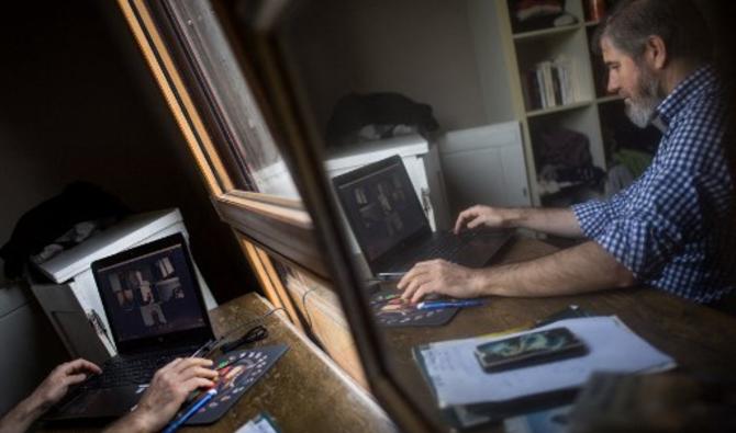 Malgré les écueils du télétravail pointés par certains salariés (isolement, logement inapproprié, intensification de la charge de travail...), des entreprises anticipent déjà la question du retour des troupes après la trêve des confiseurs. (Photo, AFP)