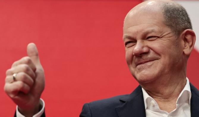 Olaf Scholz s'adressait à Berlin, lors d'un congrès extraordinaire, aux délégués de son parti SPD convoqués pour approuver le contrat de coalition conclu avec les verts et les libéraux (FDP) pour succéder au gouvernement d'Angela Merkel. (Photo, AFP)