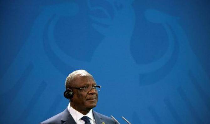 L'ancien président malien Ibrahim Boubacar Keïta assiste à une conférence de presse conjointe à la suite de sa rencontre avec la chancelière allemande à la chancellerie de Berlin, le 11 décembre 2013. (Photo, AFP)