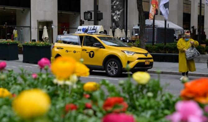 Un taxi jaune près du Rockefeller Center, le 2 avril 2021, à New York. (Photo, AFP)