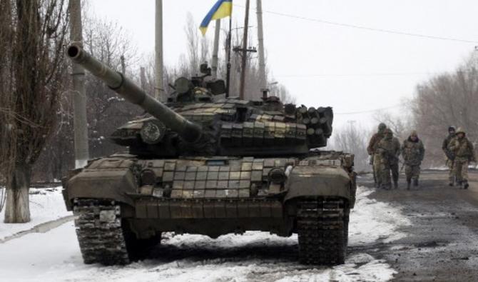 Les forces militaires ukrainiennes partent en poste dans la région de Lougansk, le 11 mars 2022. (Photo, AFP)