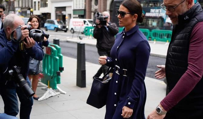 Rebekah Vardy, épouse de Jamie Vardy,  footballeur anglais à Leicester City, arrive mardi à la Haute Cour du centre de Londres pour le début du procès en diffamation de «Wagatha Christie». (Photo, AFP)