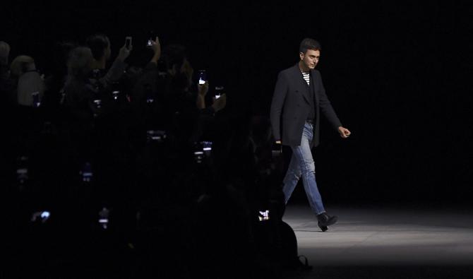 Le styliste star Hedi Slimane clôturera dimanche avec le défilé Celine une Fashion week où Givenchy a présenté sa première collection exclusivement dédiée à l'homme. (Photo, AFP)