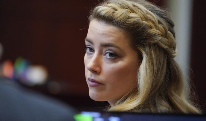 Amber Heard n'a toutefois pas éludé ses torts, admettant avoir « dit et fait des choses horribles pendant notre relation ». (Photo, AFP)