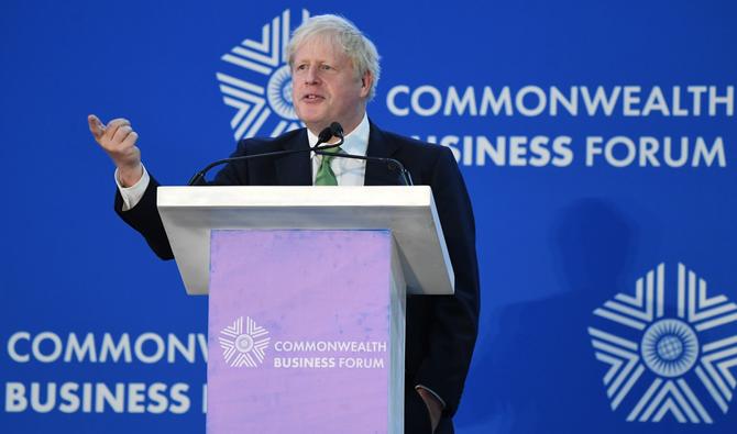 Le Premier ministre britannique Boris Johnson prononçe son discours au Business Forum à Kigali le 23 juin 2022, lors de la réunion des chefs de gouvernement du Commonwealth (CHOGM). (Photo, AFP)