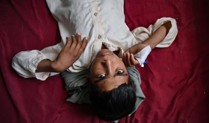 Un patient atteint du choléra se repose dans une salle de l'hôpital du district de Musa Qala à Musa Qala, Helmand, le 22 juillet 2022. (Photo, AFP)