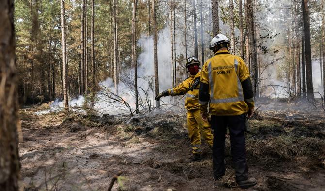 Poussées par la Tramontane, un vent de nord-ouest, les flammes se dirigeaient vers une zone montagneuse, selon les pompiers. (Photo, AFP)