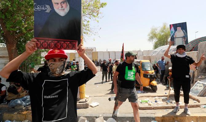 Les Brigades de la paix, une faction armée à ses ordres, affrontent le Hachd al-Chaabi, d'anciens paramilitaires intégrés aux forces de sécurité, et l'armée irakienne dans la Zone Verte. (Photo, AFP)