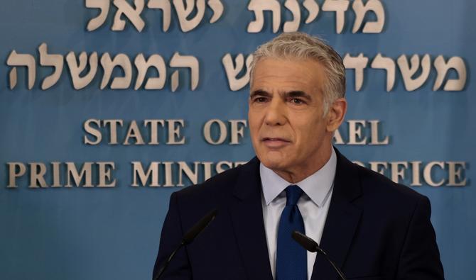 Le Premier ministre israélien Yaïr Lapid s'exprime lors d'une conférence de presse à Jérusalem, le 12 octobre 2022, suite à l'accord maritime avec le Liban. (Photo, AFP)