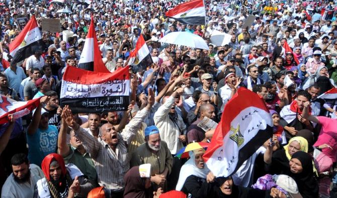 Des manifestants égyptiens crient des slogans alors qu'ils se rassemblent sur la place Tahrir au Caire le 30 septembre 2011. (Photo, Archives, AFP)