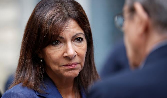 La maire de Paris Anne Hidalgo visite un chantier de construction d'un immeuble en cours de réhabilitation énergétique et d'efficacité à Paris, le 13 septembre 2022. (Photo, AFP)