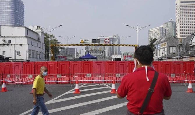 La politique zéro Covid consiste en des confinements dès l'apparition de quelques cas, en des restrictions aux voyages et en des tests PCR parfois quasi quotidiens. (Photo, AFP)