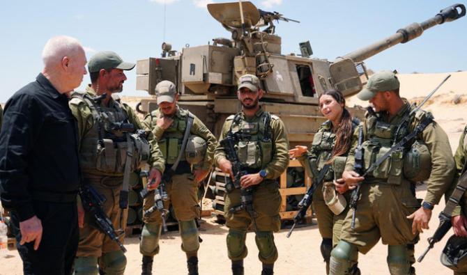 Des soldats israéliens tout sourire rangés du mauvais côté de l'histoire
